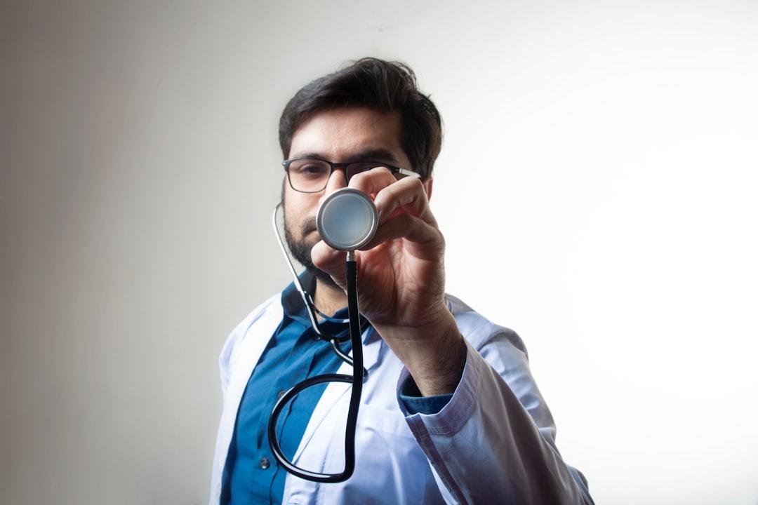 Doctor reviewing sleep study results with a patient in a modern clinic